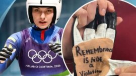 Olena Smaha a protestat dup? ce CIO a interzis casca pe care se aflau chipurile atle?ilor ucraineni uci?i în r?zboi:&nbsp;(…)