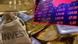 „Lunea neagr?” pe pie?ele financiare. Decizia ce a declan?at panica ?i a provocat pr?bu?irea aurului ?i argintului